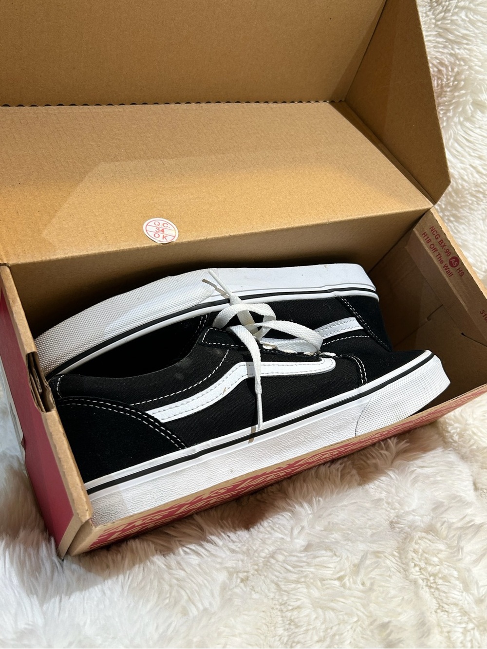 Vans Black and White Old Skool Low-Top Sneakers